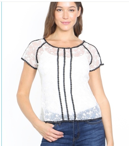 cream black top